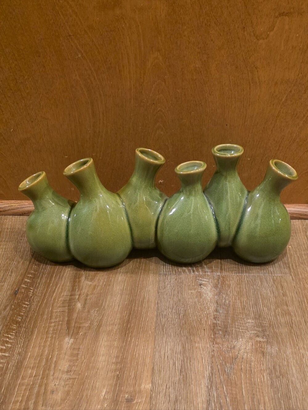 Handmade Green Glazed Ceramic 6 Bud Vase. Small chip see photos. 13"x3"x6"